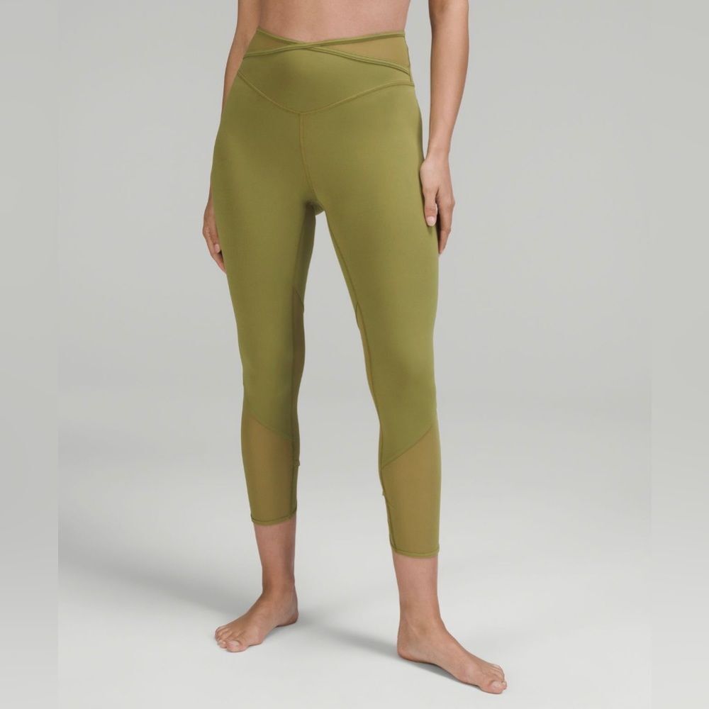Lululemon Nulu and crisscross mesh stirrup leggings size 4